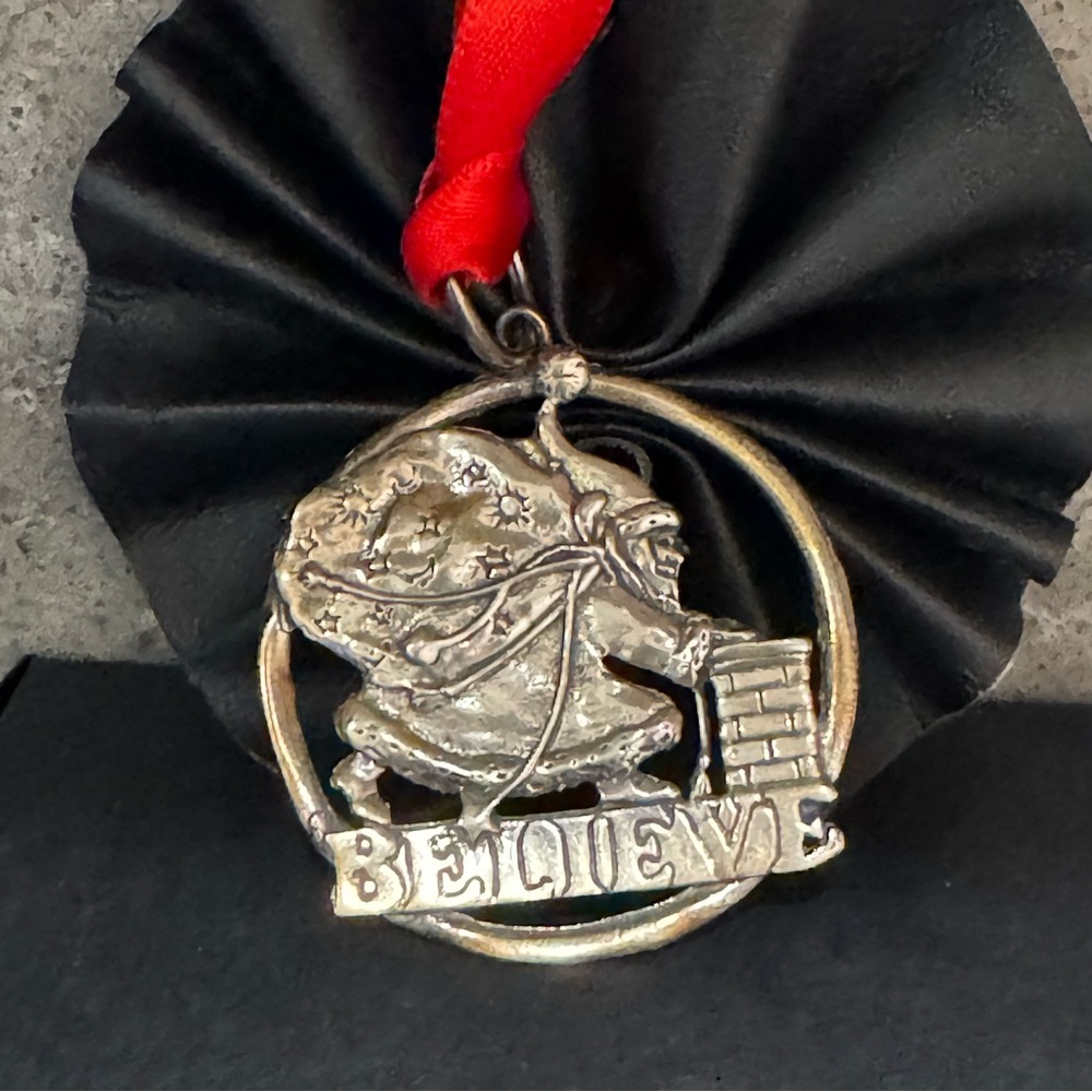 Silver Santa Ornament with Believe Inscription